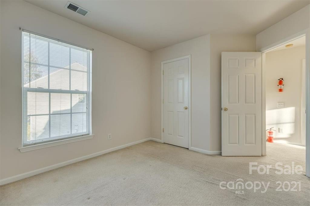 14014 Dingess Road Charlotte, NC 28273 - Photo 30 of 38 an empty room with windows