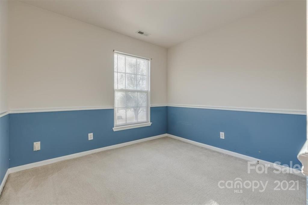14014 Dingess Road Charlotte, NC 28273 - Photo 33 of 38 an empty room with windows