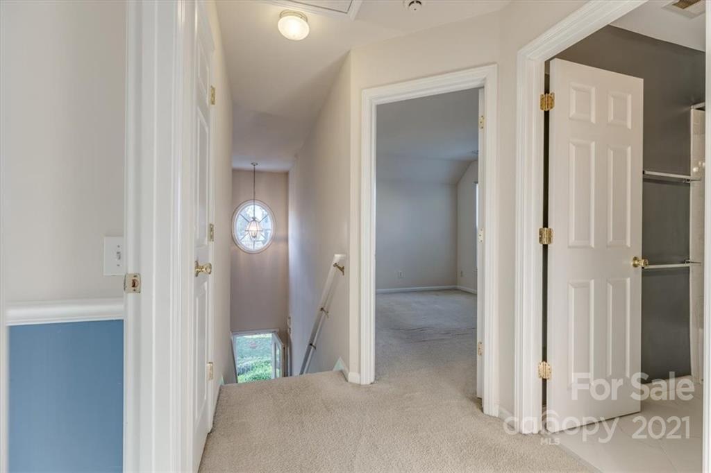 14014 Dingess Road Charlotte, NC 28273 - Photo 34 of 38 hallway with wooden floor