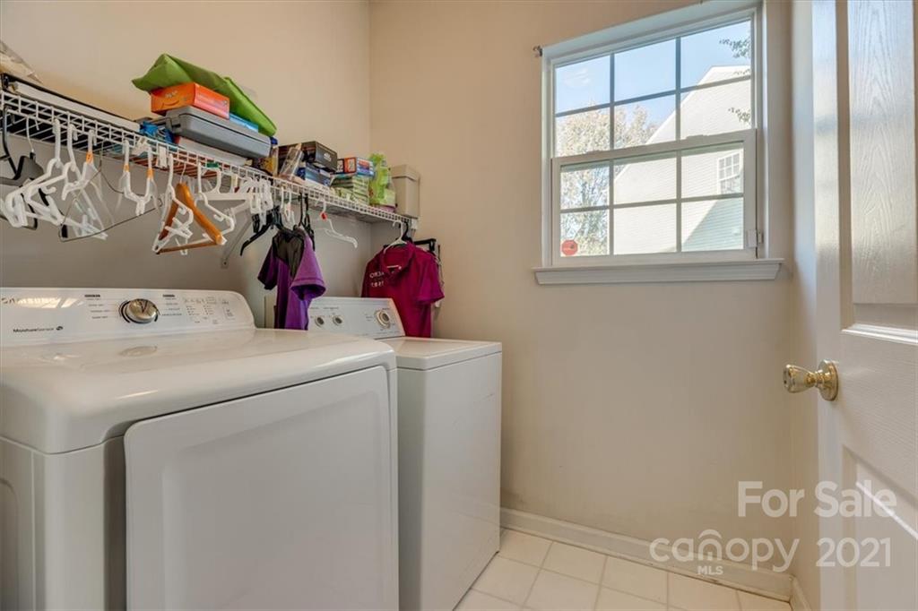 14014 Dingess Road Charlotte, NC 28273 - Photo 35 of 38 a utility room with dryer and washer