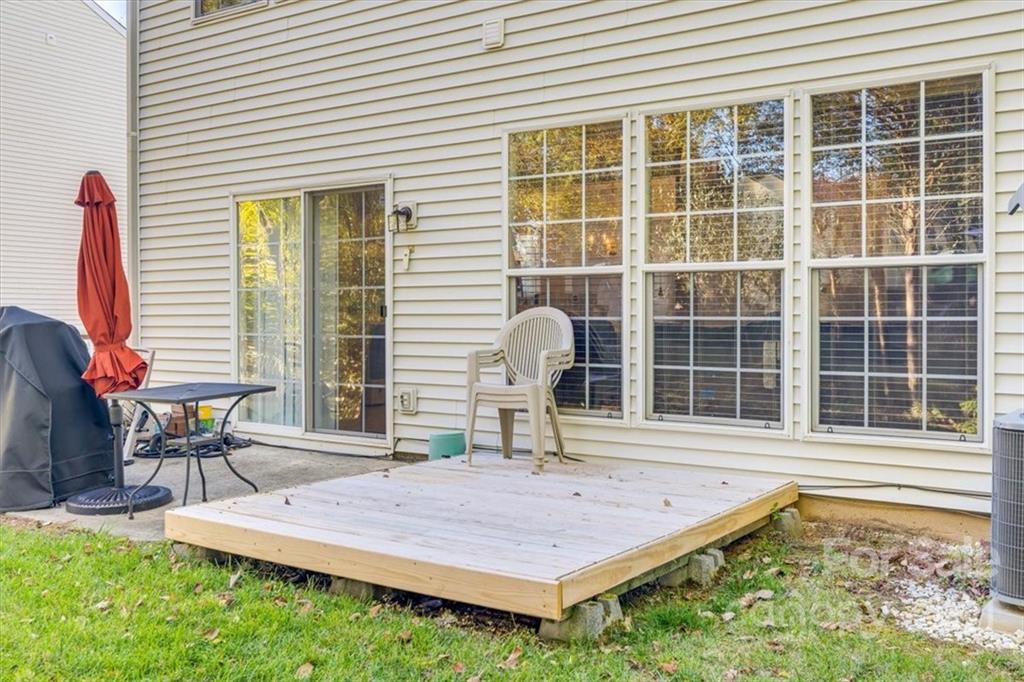 14014 Dingess Road Charlotte, NC 28273 - Photo 38 of 38 a front view of a house with a yard