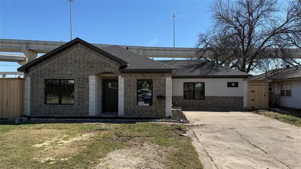 a house with trees in front of it