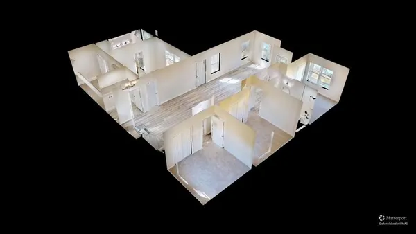 a view of a living room with furniture