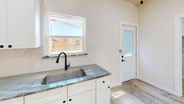 a close view of a sink and a vanity in the bathroom