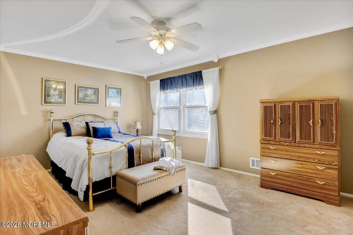 16 Regina Drive Howell, NJ 07731 - Photo 20 of 33 a bed room with bed and window