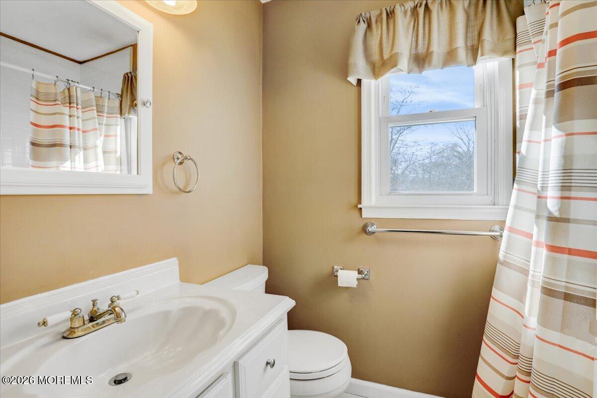 16 Regina Drive Howell, NJ 07731 - Photo 25 of 33 a bathroom with a sink and a toilet