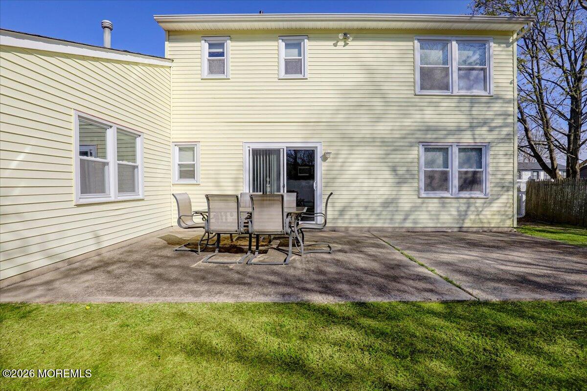 16 Regina Drive Howell, NJ 07731 - Photo 27 of 33 a view of backyard of house with outdoor seating and barbeque oven