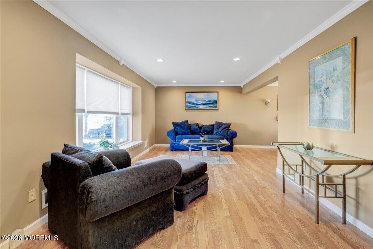 16 Regina Drive Howell, NJ 07731 - Photo 7 of 33 a living room with furniture and a large window
