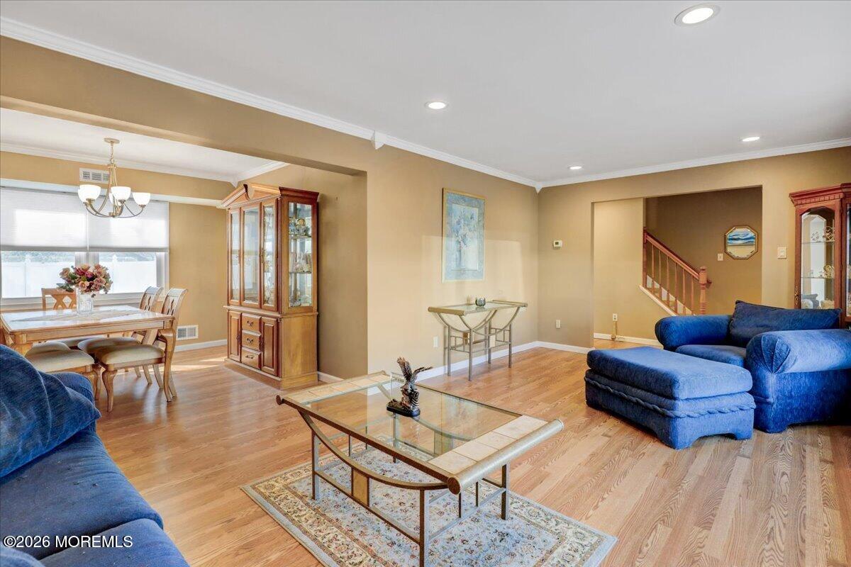 16 Regina Drive Howell, NJ 07731 - Photo 8 of 33 a living room with furniture and wooden floor