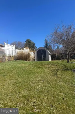 a house view with garden space