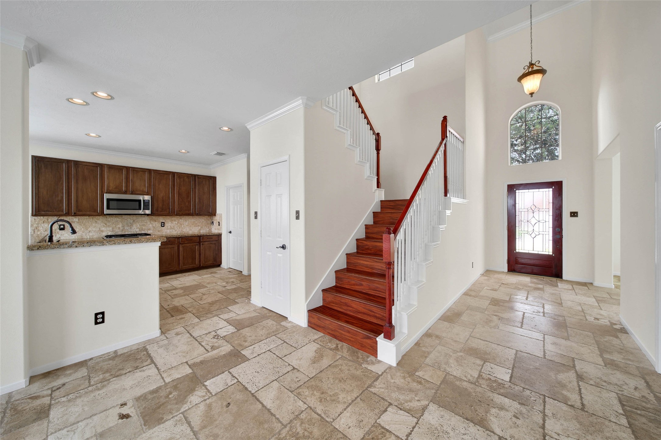 2215 2 Trail Drive Spring, TX 77373 - Photo 4 of 46 Two Story Foyer greets guests as the enter the home. To the right of the front door is the formal living/dining room that can also serve as a home office.