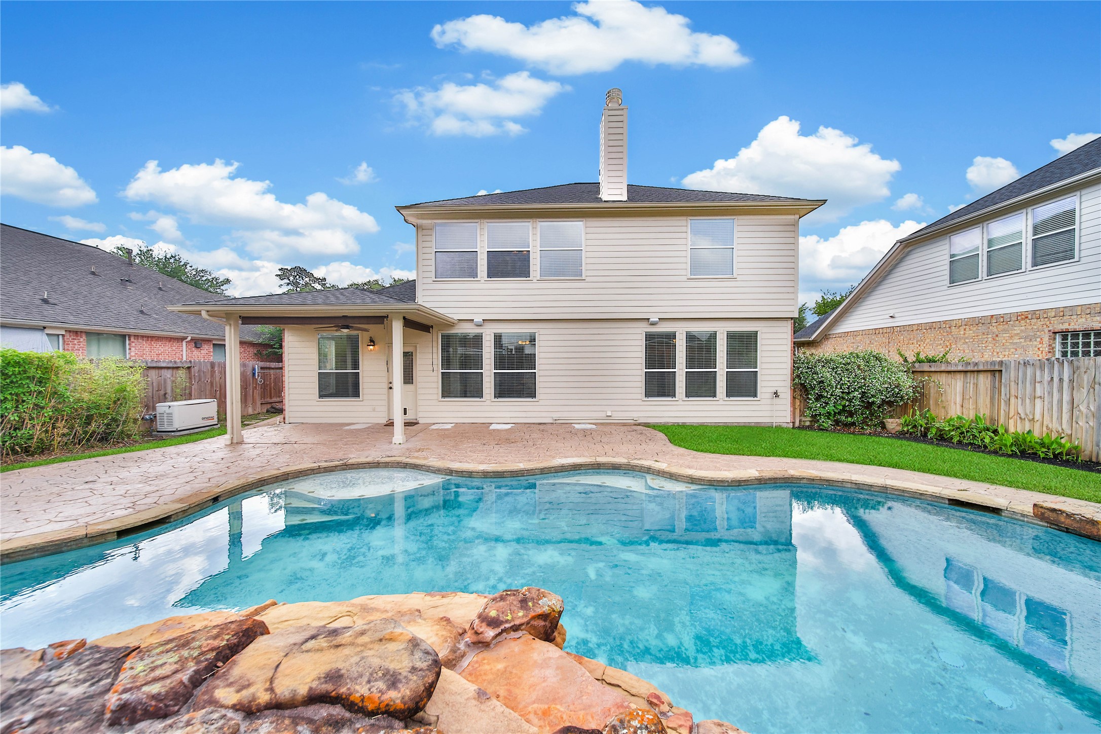 2215 2 Trail Drive Spring, TX 77373 - Photo 42 of 46 Enjoy the beautiful lagoon pool with rock waterfall.