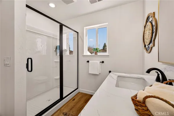 a bathroom with a bathtub and shower