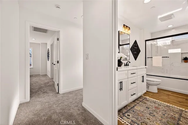 a bedroom with bed and window