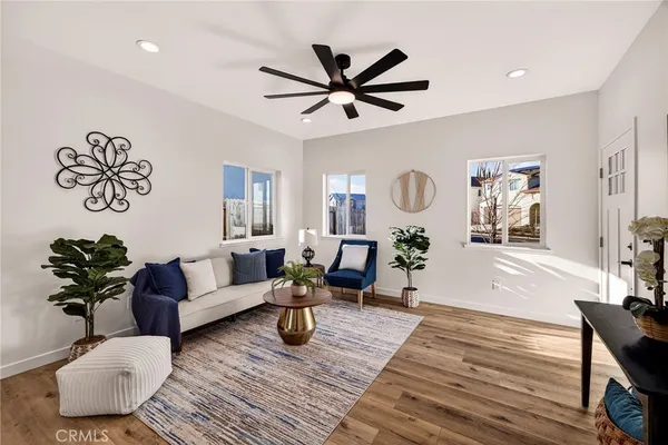 a kitchen with stainless steel appliances a stove microwave and cabinets