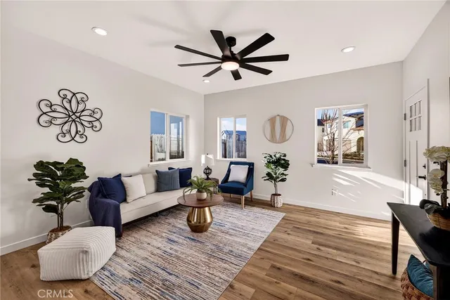 a kitchen with stainless steel appliances a stove microwave and cabinets