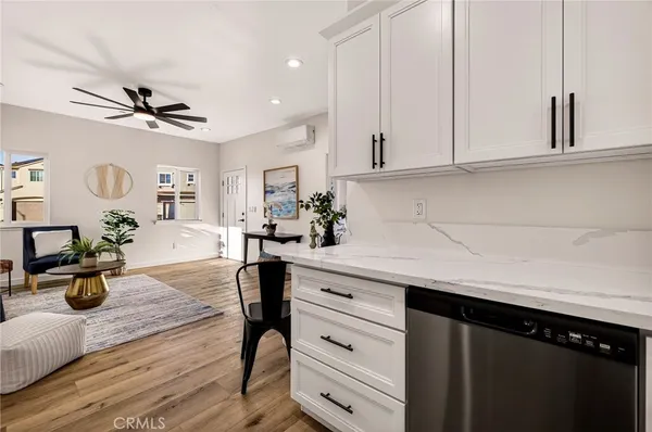 a bath room with a sink and a mirror