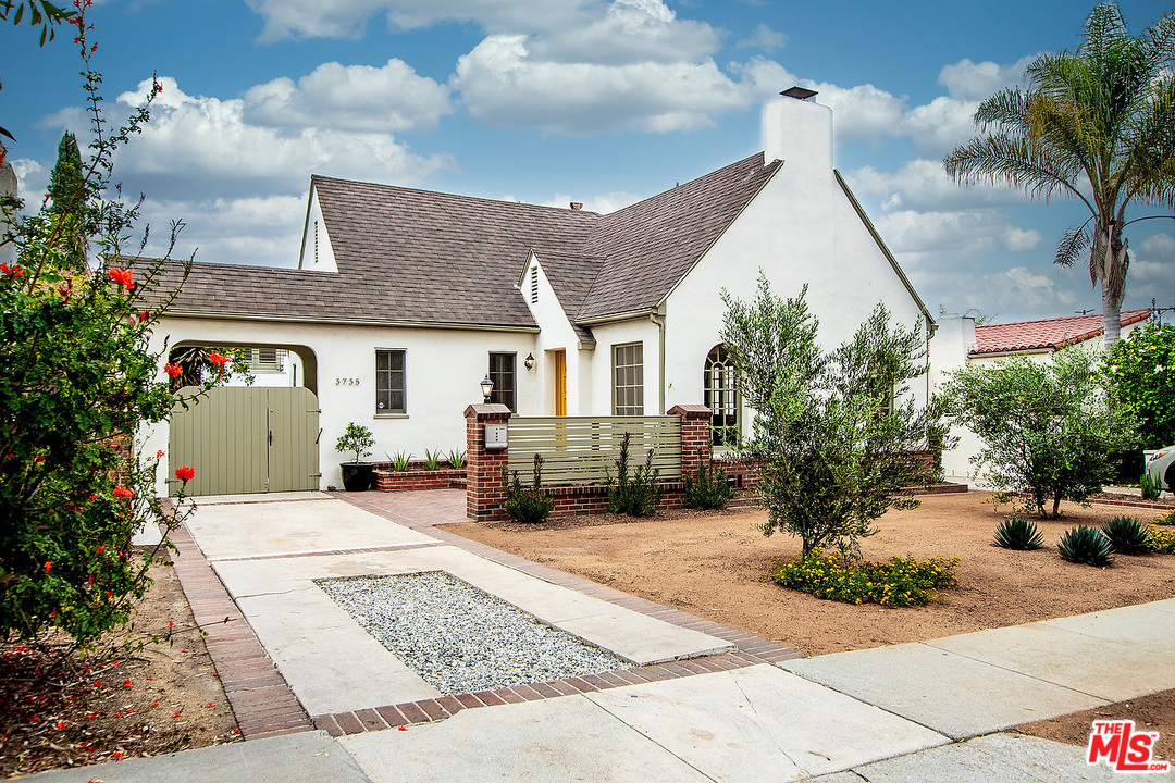 a view of a house with a patio