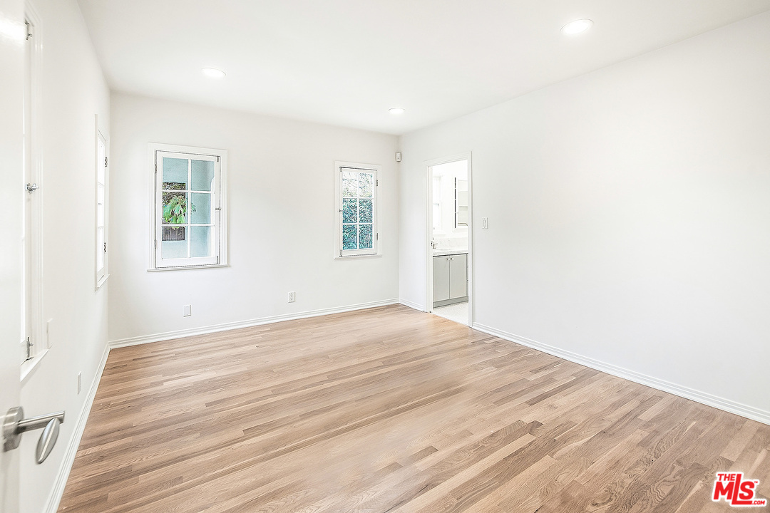 3735 Moore Street Los Angeles, CA 90066 - Photo 15 of 34 a view of an empty room with wooden floor and a window