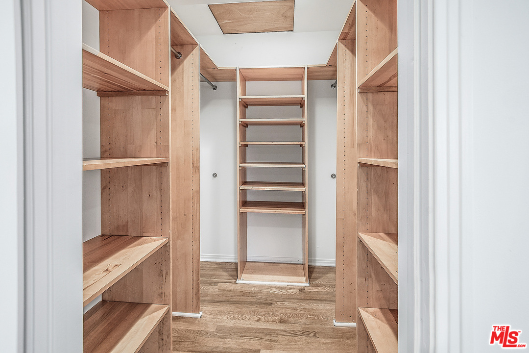 3735 Moore Street Los Angeles, CA 90066 - Photo 17 of 34 a view of walk in closet with empty racks