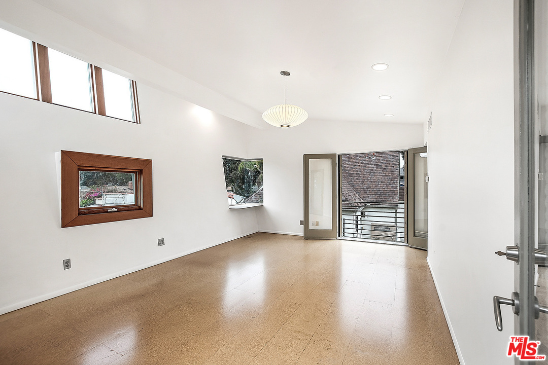 3735 Moore Street Los Angeles, CA 90066 - Photo 26 of 34 a view of a room with wooden floor and window
