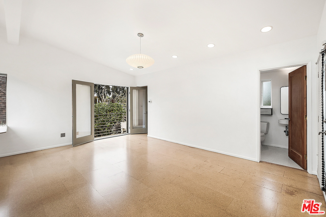 3735 Moore Street Los Angeles, CA 90066 - Photo 27 of 34 an empty room with windows and cabinet