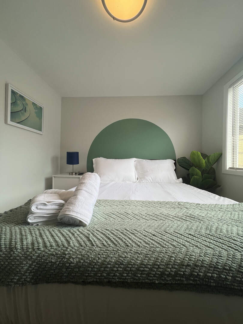 912 East St Charles Road Lombard, IL 60148 - Photo 19 of 27 a bed sitting in a bedroom next to a window