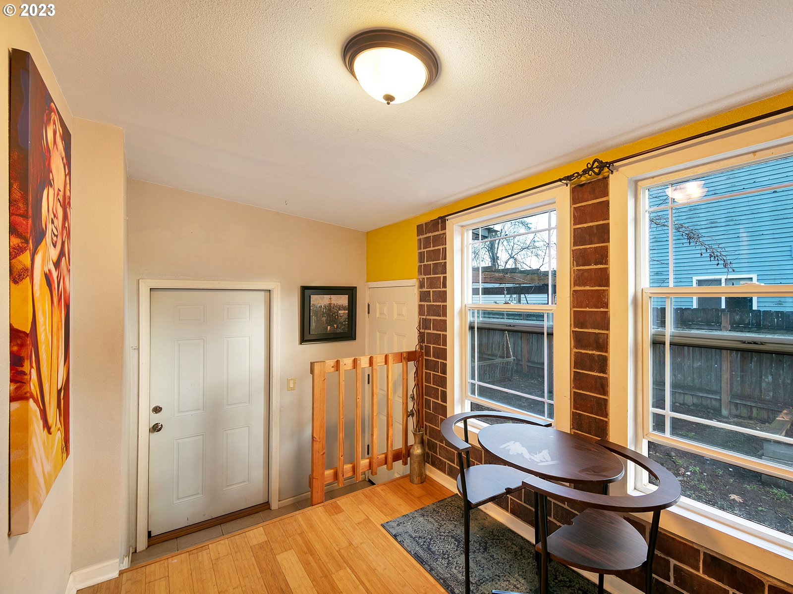 8034 Southeast Henderson Street Portland, OR 97206 - Photo 13 of 23 a living room with furniture and a window