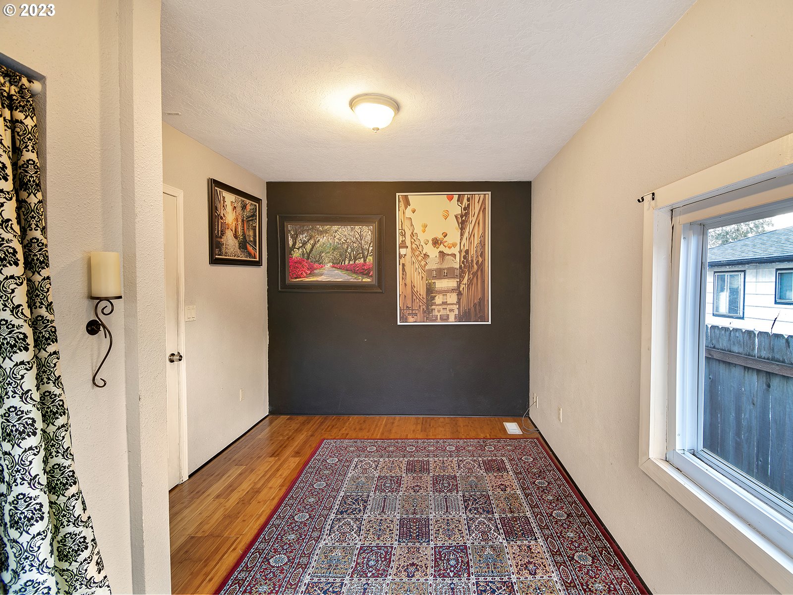 8034 Southeast Henderson Street Portland, OR 97206 - Photo 14 of 23 a view of hallway with window and stairs