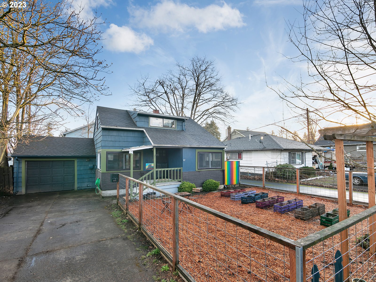 8034 Southeast Henderson Street Portland, OR 97206 - Photo 2 of 23 front view of a house with a patio