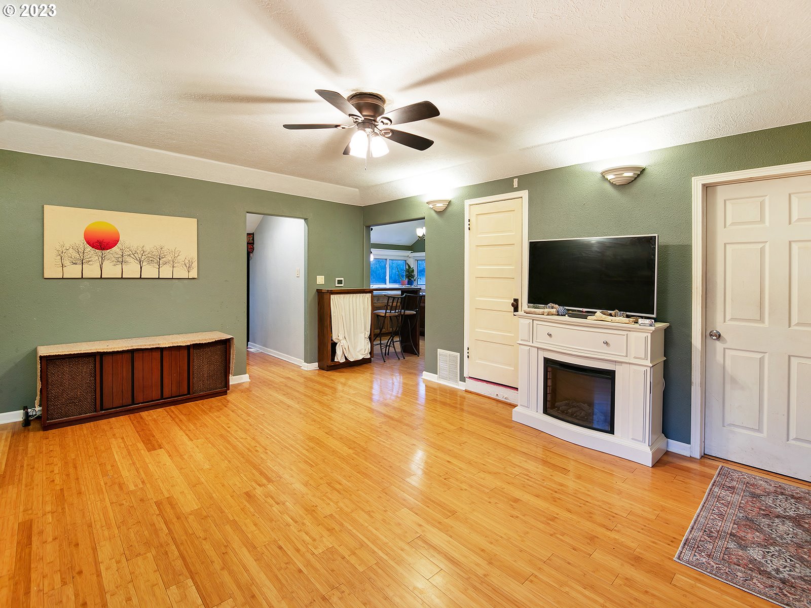 8034 Southeast Henderson Street Portland, OR 97206 - Photo 8 of 23 a living room with furniture and a flat screen tv