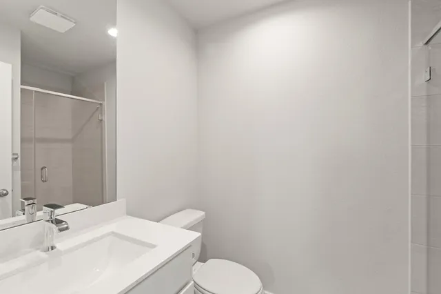 a bathroom with a sink and toilet