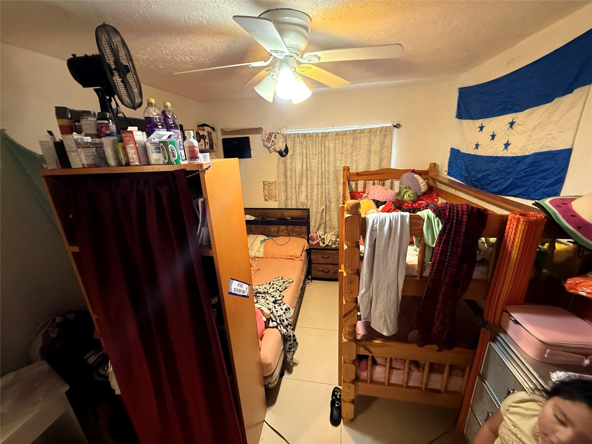 1028 Northwest 24th Street Miami, FL 33127 - Photo 10 of 24 a view of a room with gym equipment