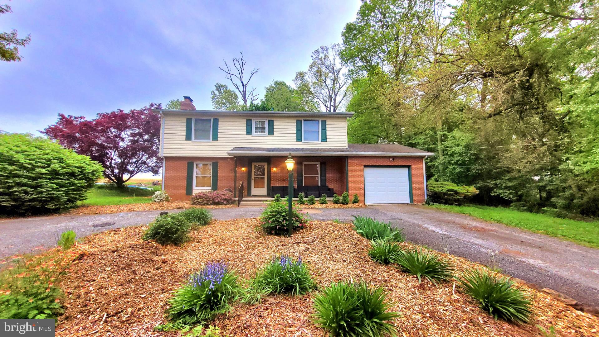 1815 Manchester Road Westminster, MD 21157 - Photo 40 of 45 Charming home nestled in lush greenery.