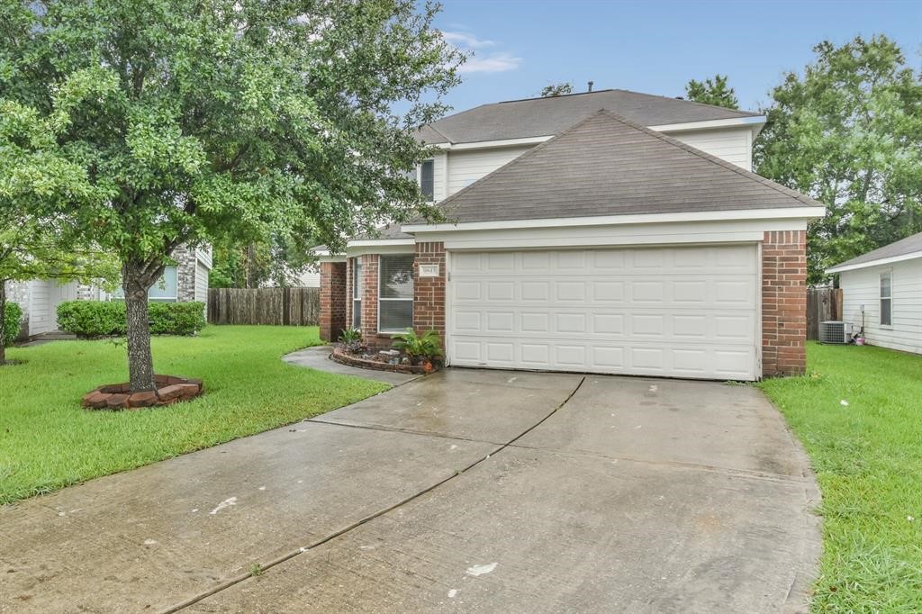 9845 Youpon Ridge Way Conroe, TX 77385 - Photo 3 of 28