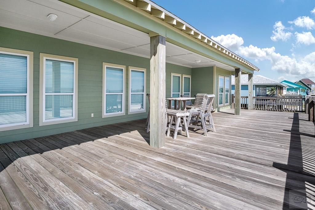 437 Atkinson Street Crystal Beach, TX 77650 - Photo 29 of 40 a outdoor space with furniture