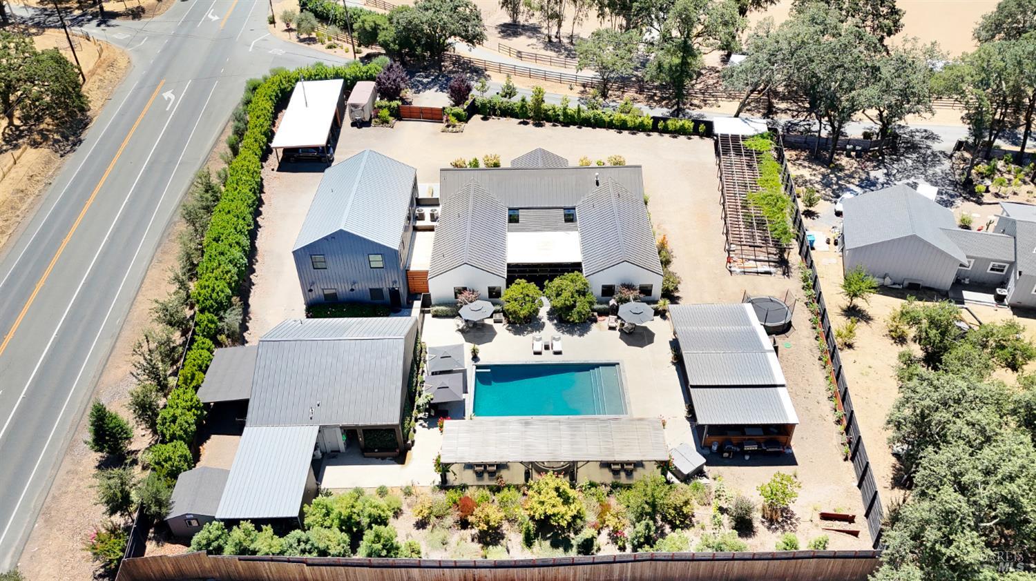 85 Trinity Road Glen Ellen, CA 95442 - Photo 62 of 62 an aerial view of a house with a yard and garden