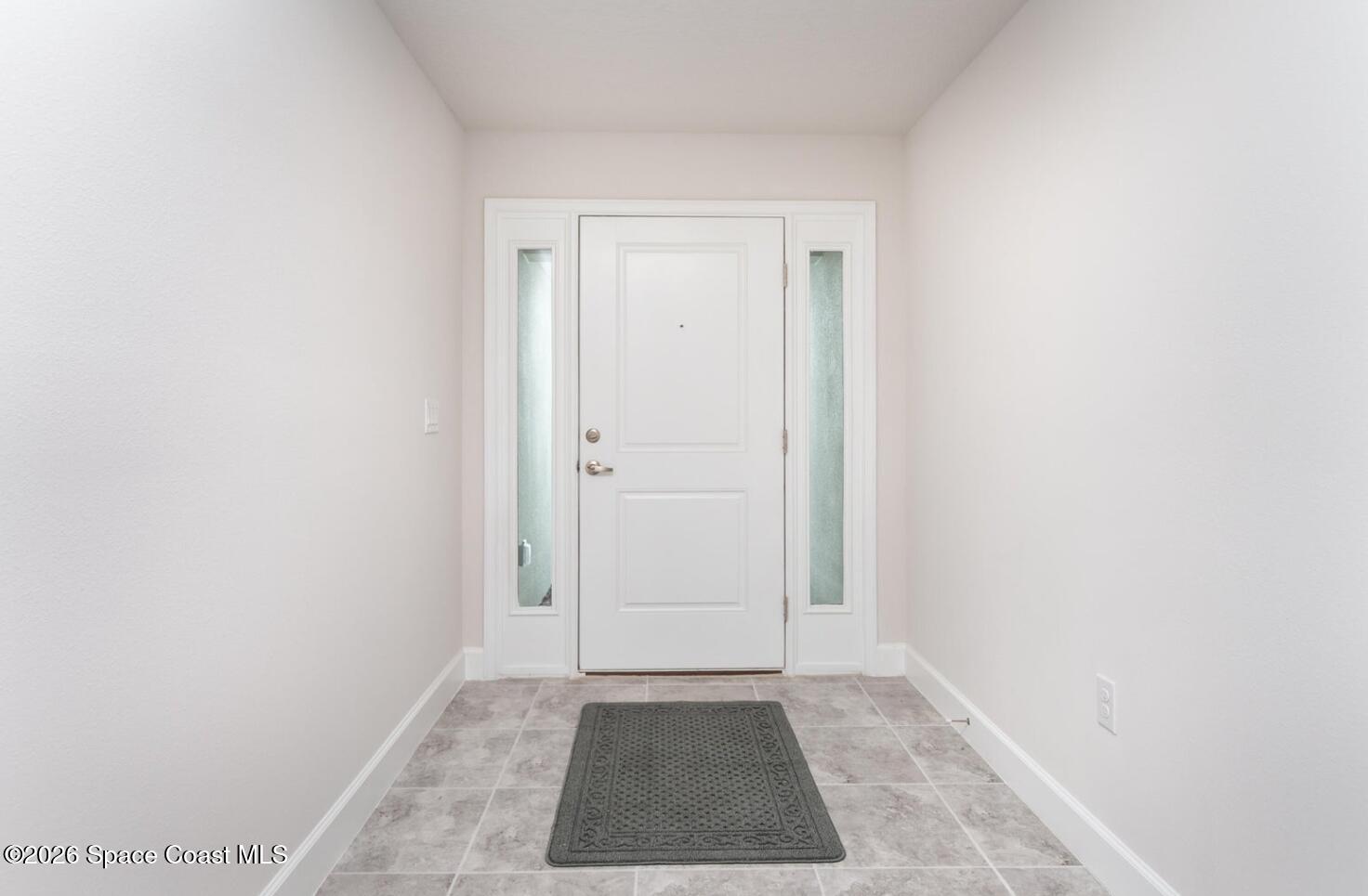 1361 Tupelo Circle Cocoa, FL 32926 - Photo 2 of 7 a view of an empty room