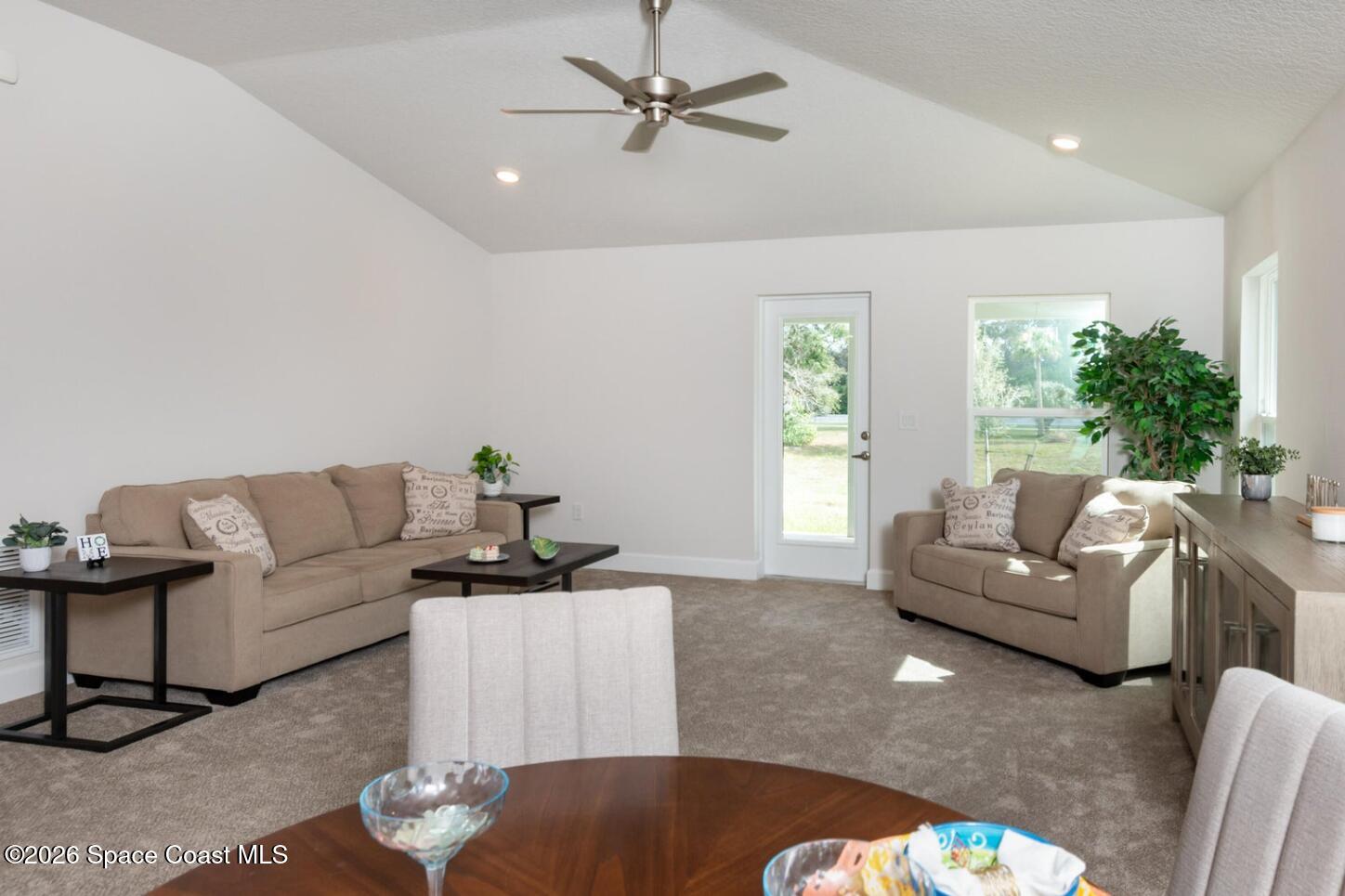 1361 Tupelo Circle Cocoa, FL 32926 - Photo 4 of 7 a living room with furniture and wooden floor
