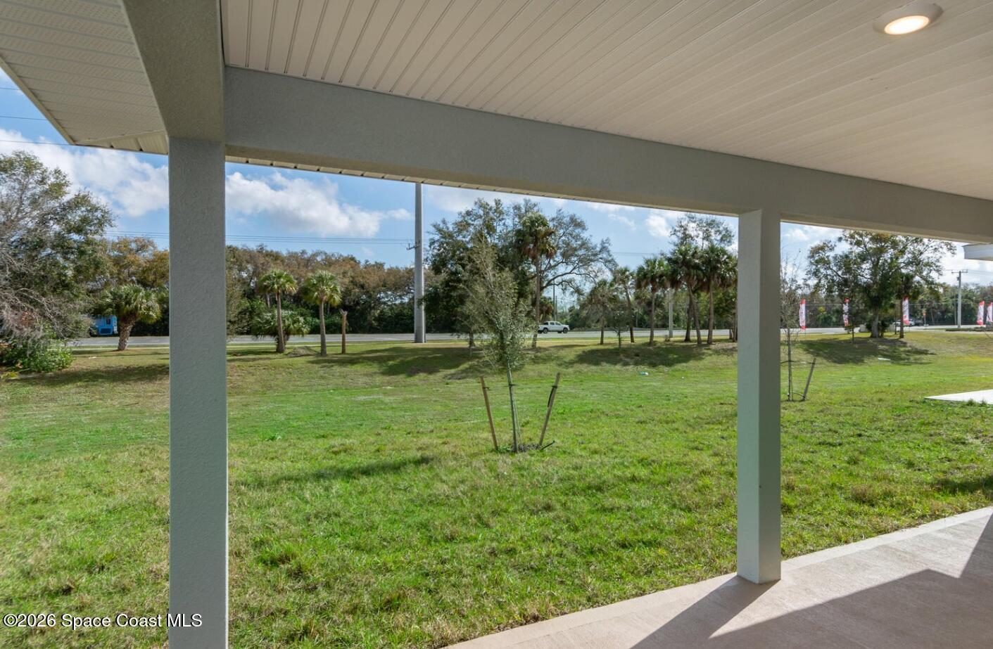 1361 Tupelo Circle Cocoa, FL 32926 - Photo 7 of 7 a view of green field with a big yard