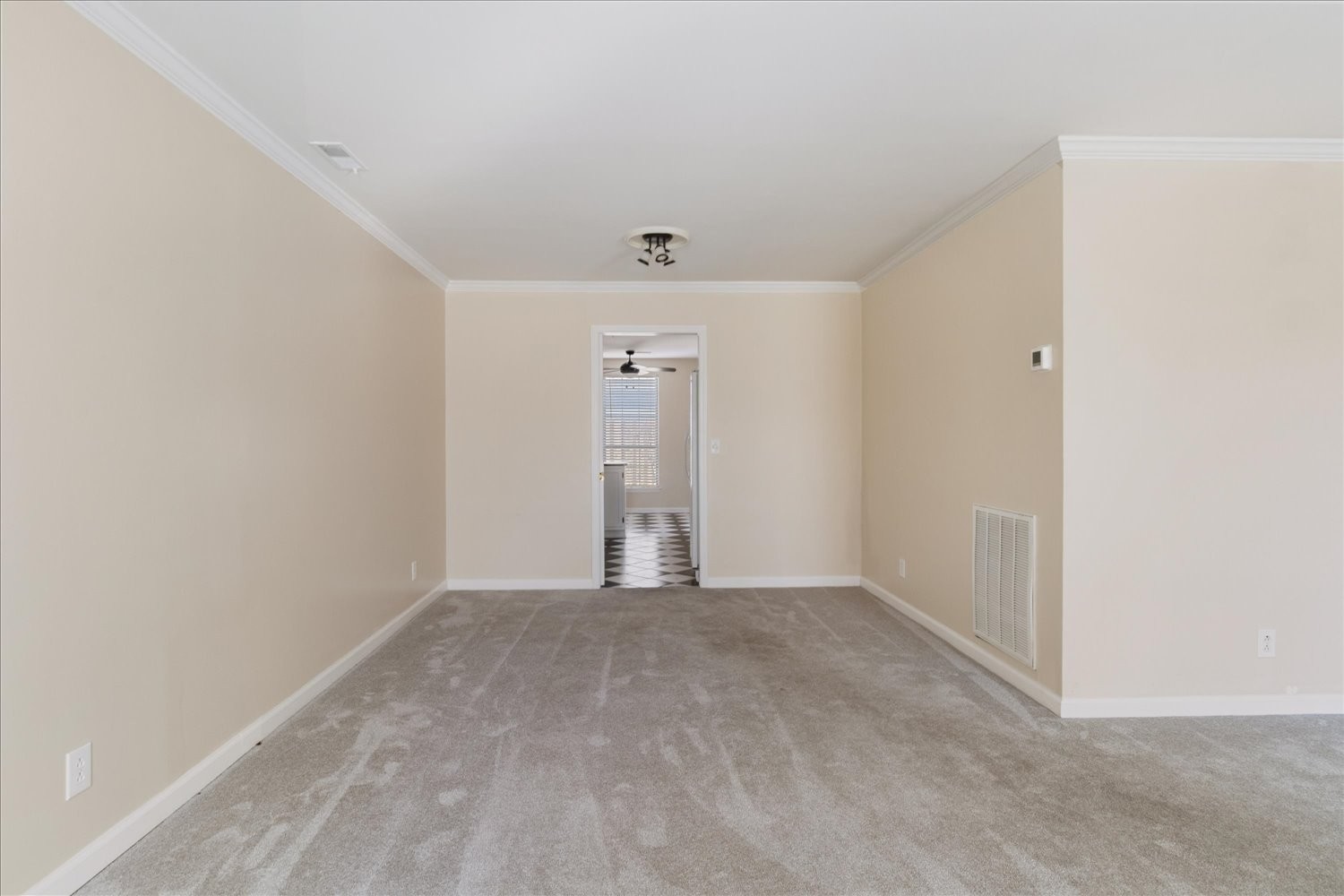 975 General George Patton Road Nashville, TN 37221 - Photo 13 of 32 a view of an empty room with wooden floor and a window