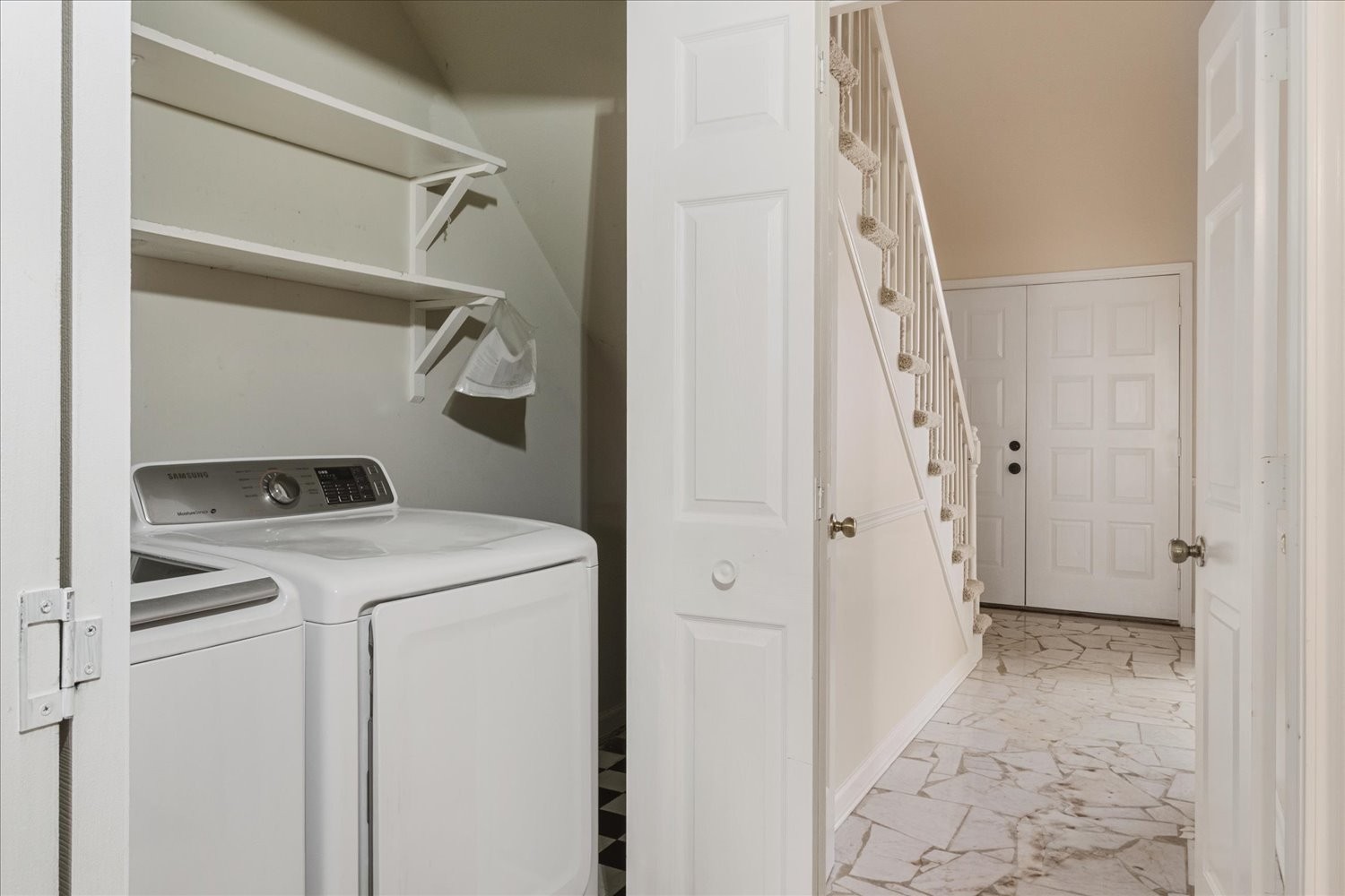 975 General George Patton Road Nashville, TN 37221 - Photo 14 of 32 a view of storage and utility room with washer and dryer