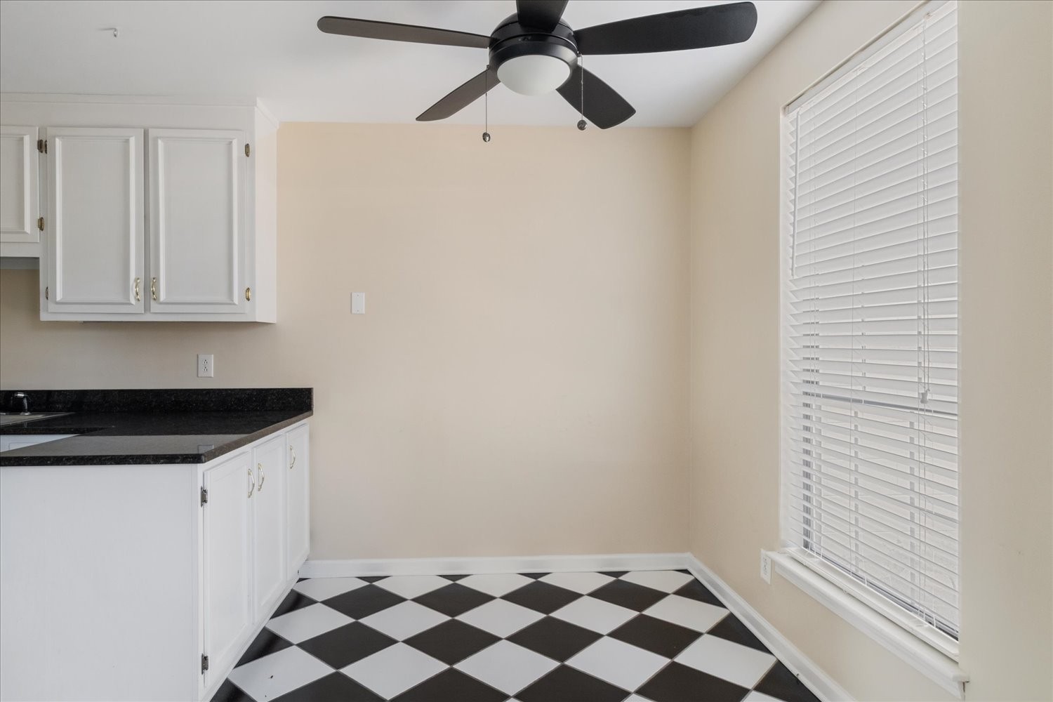 975 General George Patton Road Nashville, TN 37221 - Photo 6 of 32 a room with a black white checkered floor
