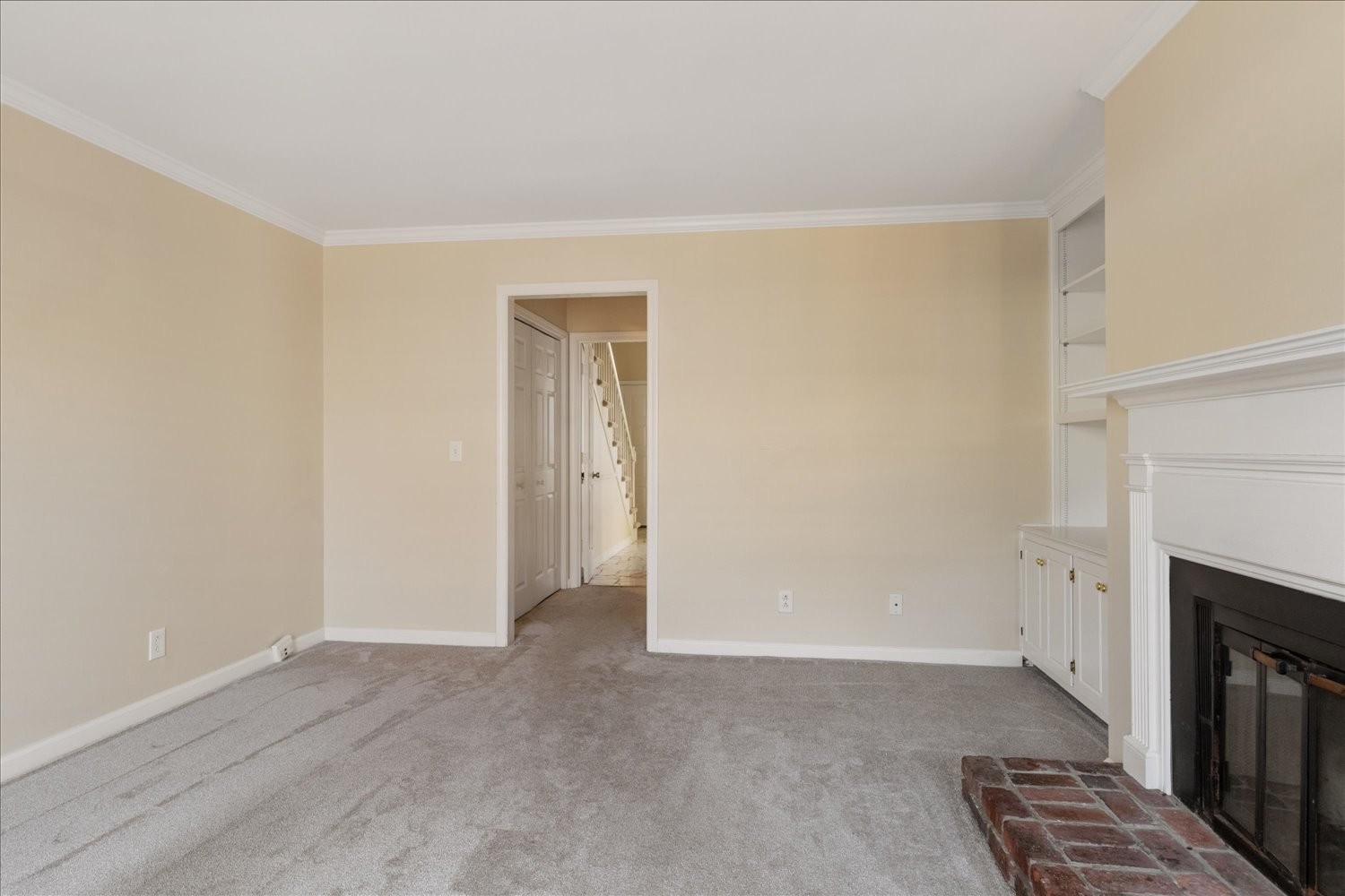 975 General George Patton Road Nashville, TN 37221 - Photo 9 of 32 a view of an empty room with wooden floor and a fireplace
