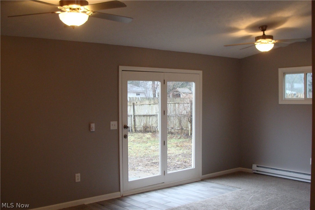 3030 Polly Road Ravenna, OH 44266 - Photo 23 of 35 View from Kitchen of Family room and new French doors leading to back yard