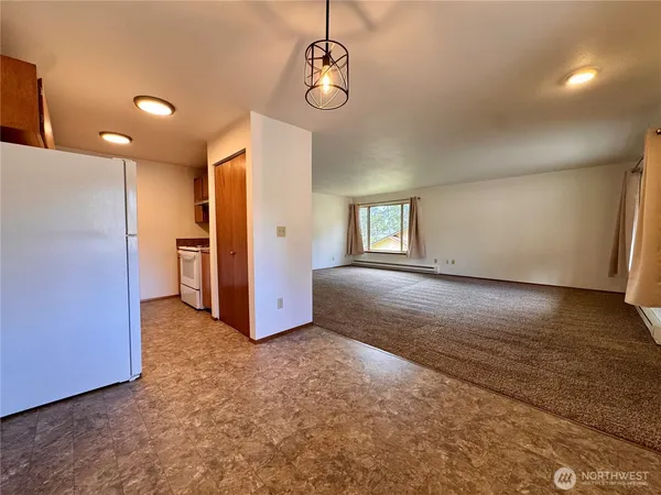 a view of livingroom with kitchen