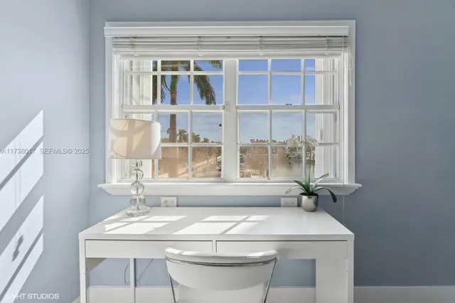 a table with a sink and a window