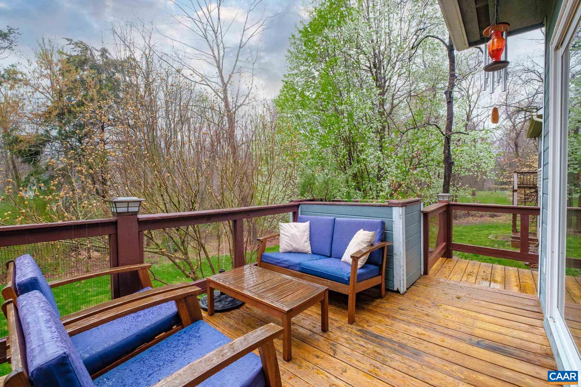 265 Turkey Ridge Road Charlottesville, VA 22903 - Photo 52 of 57 a view of a two chairs in the balcony