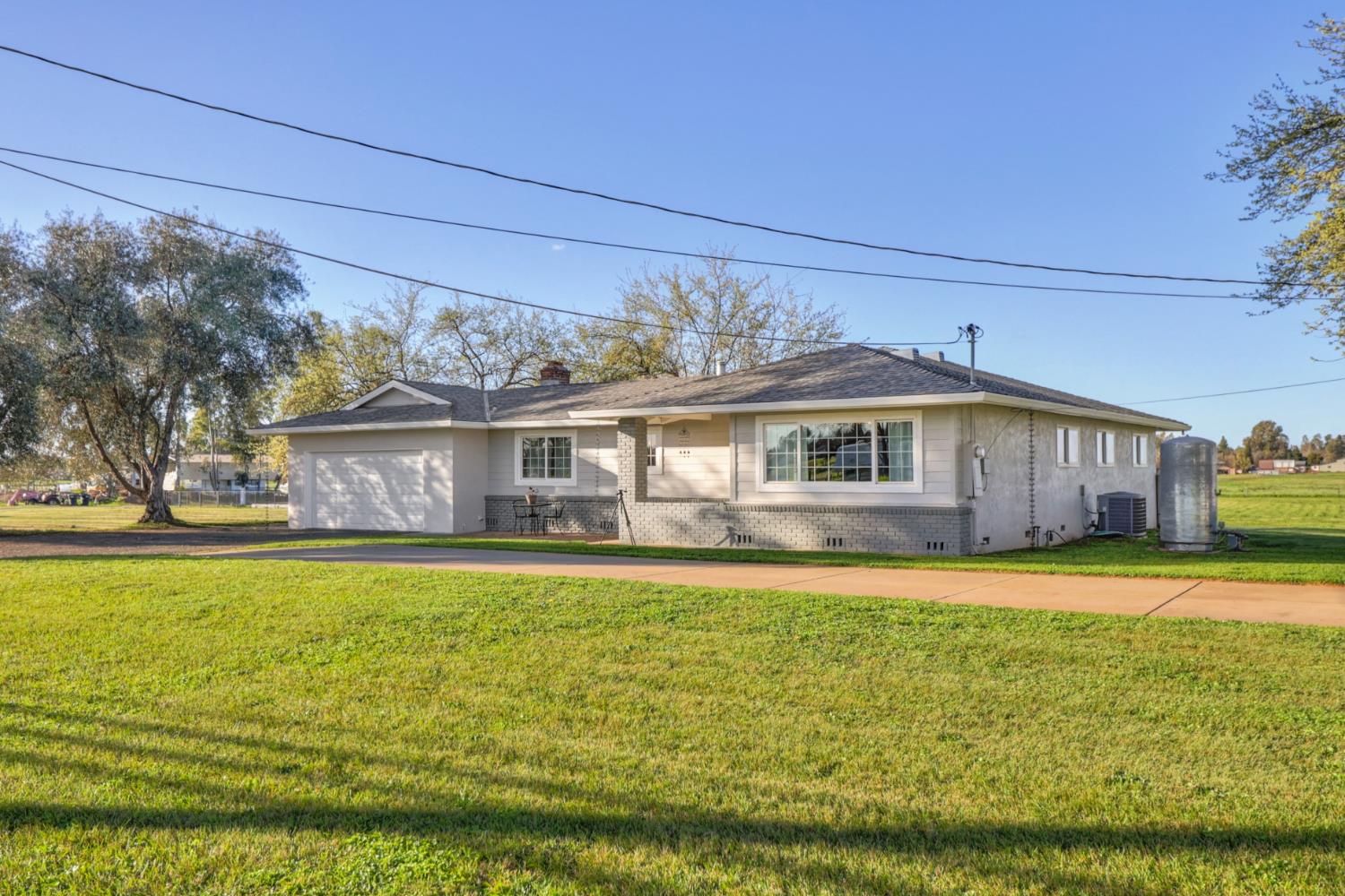 10691 Calvine Road Sacramento, CA 95830 - Photo 2 of 47 a front view of a house with a big yard