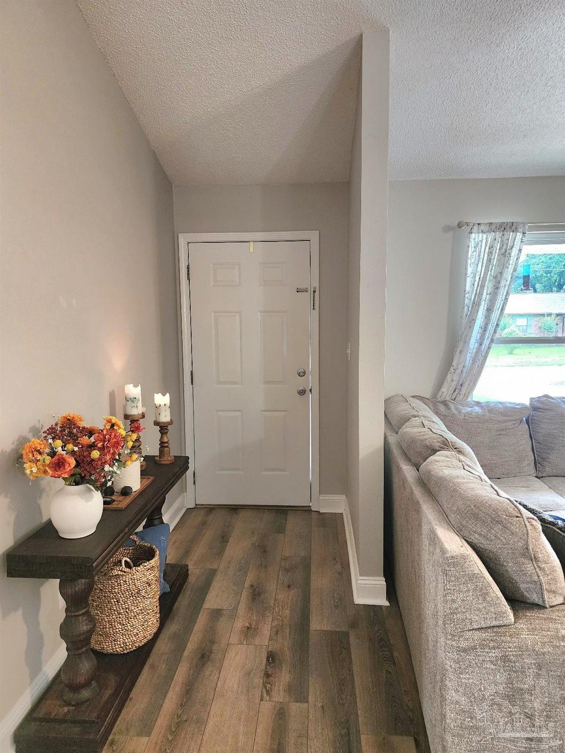 4348 Wellington Drive Pace, FL 32571 - Photo 5 of 20 a room with furniture and wooden floor